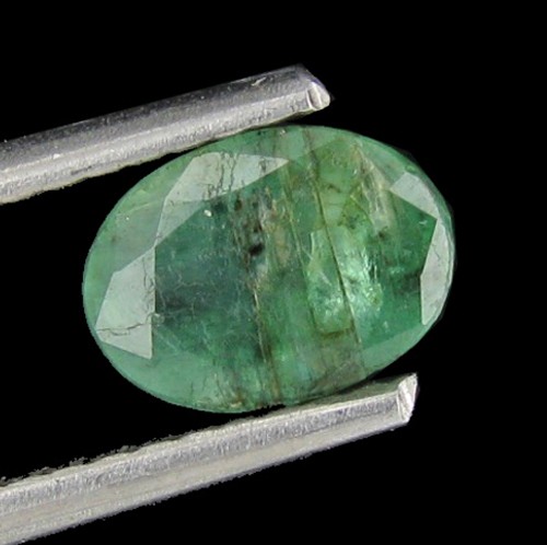 0.77ct Colombia Emerald: Excellent piece; well cut and colored; with treatment