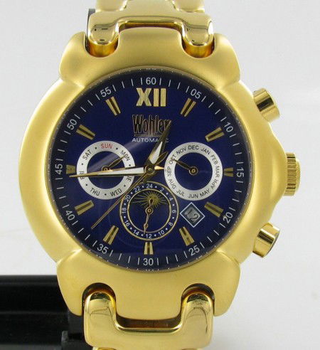 New Wohler Mens CHRONO Function Watch: Brand New Wohler men's stylish sport CHRONOGRAPH function watch in excellent new condition with date, 24-hour, weekday and month dials; stainless gold tone case and band; box and papers; retail $2495