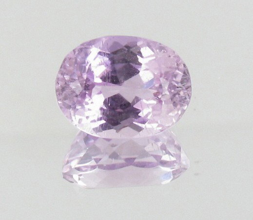 12.15ct Natural Patroke Pink Kunzite: Excellent piece; well cut and colored; with treatment