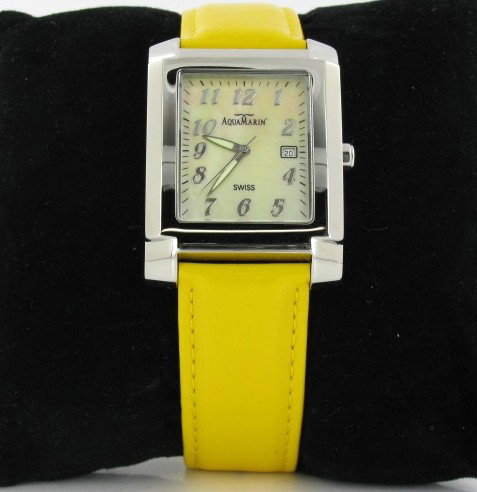 Aqua Marin Men's Tank Style Skeleton Watch: New tank style watch in excellent condition with yellow mother-of-pearl face and matching leather band; box and papers; retail $1995