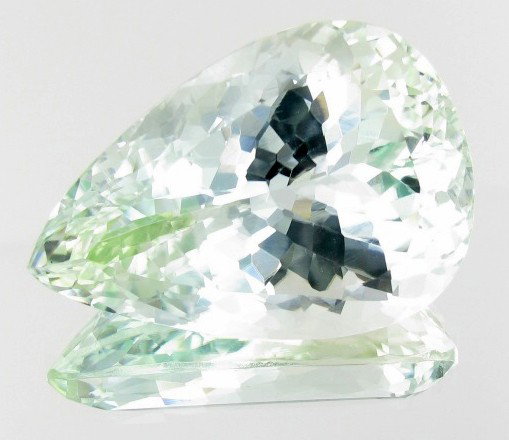 83.4ct Top Sparkling Green Kunzite: Excellent piece; well cut and colored; with treatment