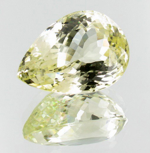 54.45ct Deep Patroke Green Kunzite: Excellent piece; well cut & colored; with treatment