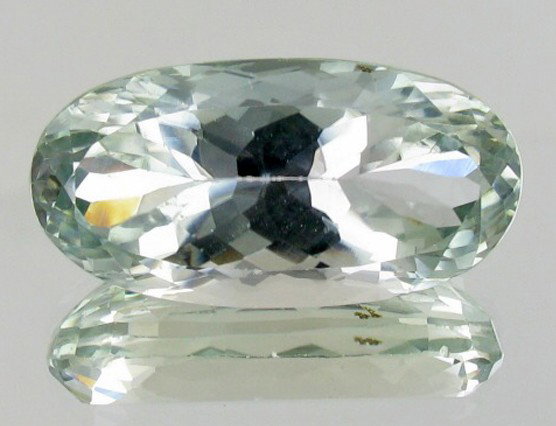 26.95ct Lush Green Kunzite: Excellent piece; well cut and colored; with treatment