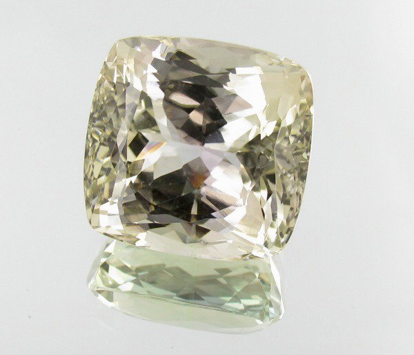 61.0ct Flawless Beautiful Yellowish Green Kunzite: Excellent piece; well cut & colored; with treatment