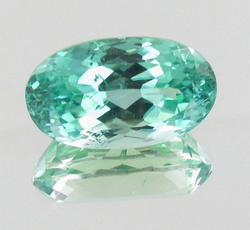 20.7ct Hot Green Kunzite: Excellent piece; well cut and colored; with treatment