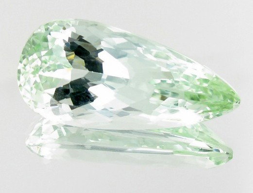 33.50ct Natural Light Green Kunzite: Excellent piece; well cut and colored; with treatment