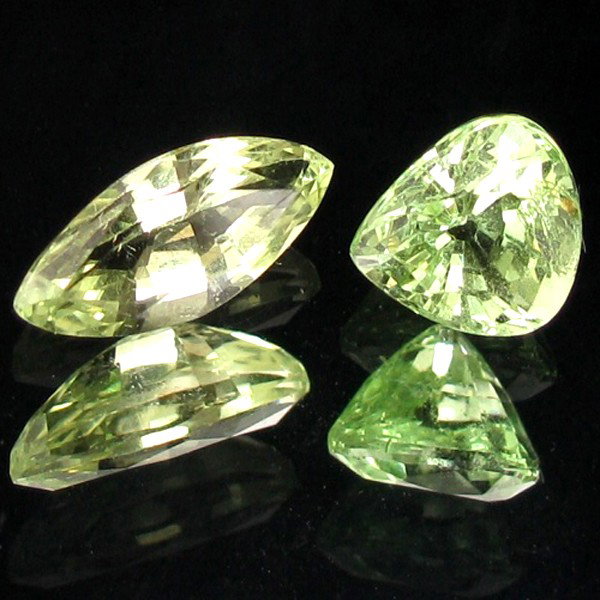 2.6ct Yellow Grn Tsavorite Garnet Appraised $13k: Excellent yellow green colored parcel 2 pieces mixed cut; lab quality evaluation 7; treatment as noted; Gem Guide wholesale $1913-$3188; full retail appraisal $12753; full lab evaluation available