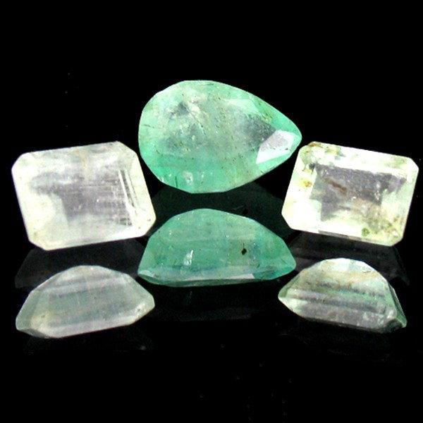 6.51ct Colombian Emerald Appraised $14k: Excellent light green colored specimen emerald/pear cut; lab quality evaluation 4; treatment as noted; Gem Guide wholesale $2279-$3255; full retail appraisal $14397; full lab evaluation available