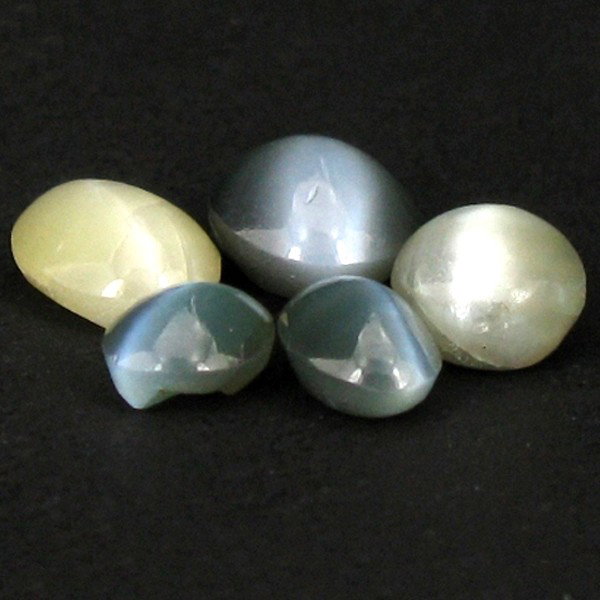 4.89ct Chrosyberyl Cat's Eye Appraised $13k: Excellent green colored specimen oval cut; lab quality evaluation 6; treatment as noted; Gem Guide wholesale $2445-$3668; full retail appraisal $13447; full lab evaluation available