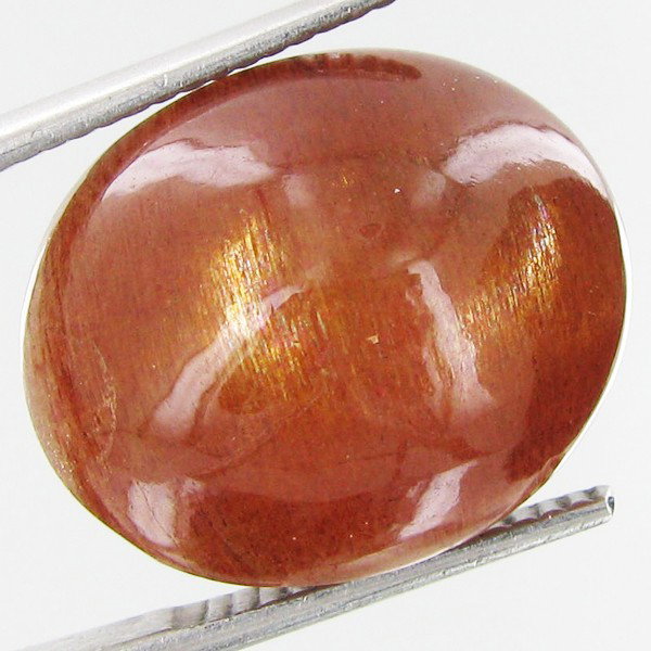 15.80ct Vibrant Sunstone Cat's Eye Cabochon: Excellent piece; well cut & colored; with treatment
