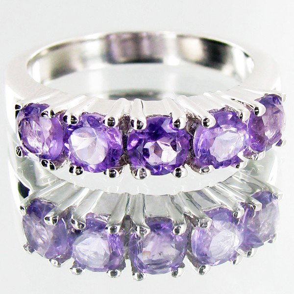 23.40ctw Orange Garnet Sterling Ring: Nice workmanship