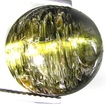 12.41ct Natural Green Tourmaline Cats Eye: scarce sought after green extremely clear well colored