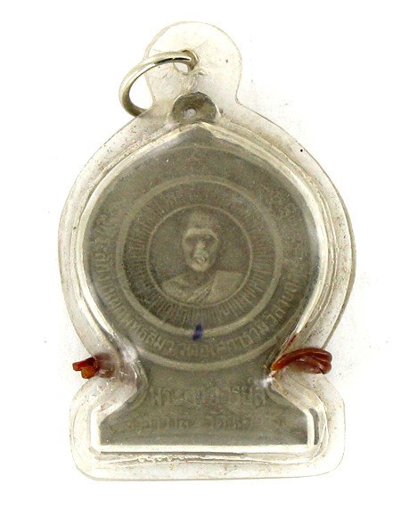 Antique Thai Silver Clay Buddha Amulet in Plastic: Excellent antique piece