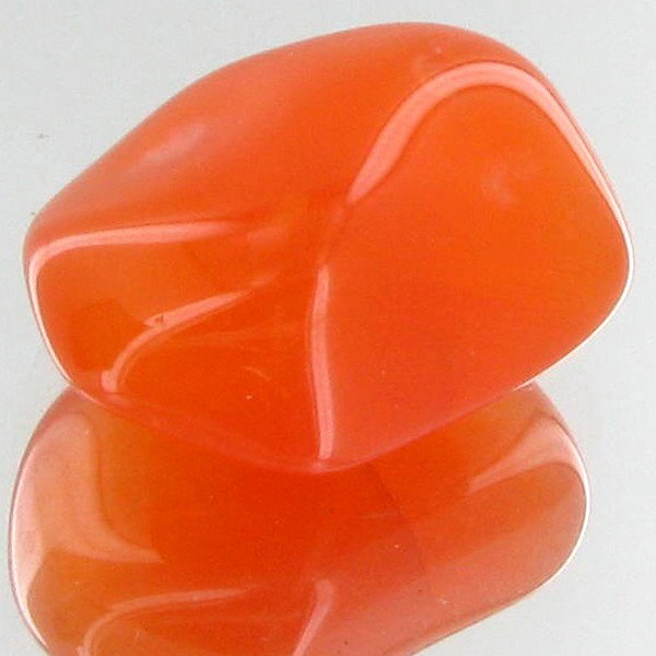 25.65ct Carnelian Freeform Cabochon: Excellent and well colored; with treatment