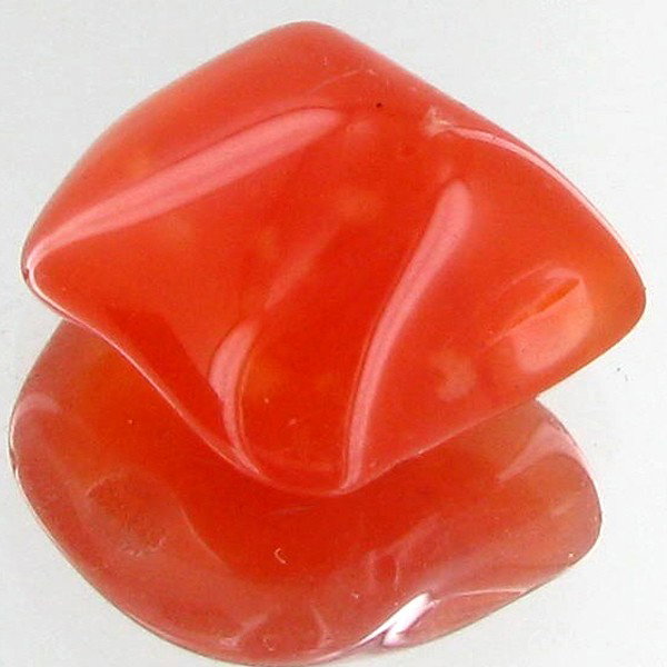 22.45ct Carnelian Freeform Cabochon: Excellent and well colored; with treatment