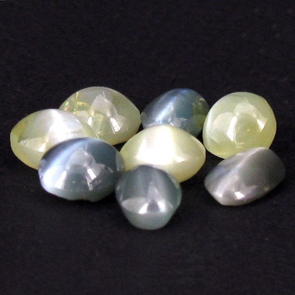 6.29ct Chrosyberyl Cat's Eye Appraised $14k: Excellent green colored specimen oval cut; lab quality evaluation 5; treatment as noted; Gem Guide wholesale $3145-$4718; full retail appraisal $14309; full lab evaluation available