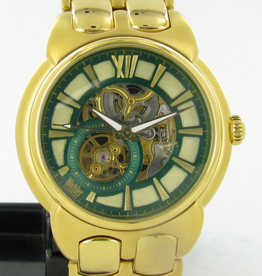 New Wohler Mens Skeleton Style Watch: Brand New Wohler men's stylish skeleton style watch in excellent new condition with seconds dial; stainless gold tone case andband; box and papers; retail $1895