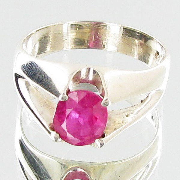 26.48ctw Mozambique Ruby Sterling Ring: Excellent well crafted piece; stone well cut/colored with treatment