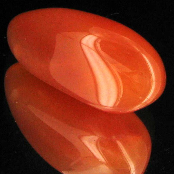 32.6ct Carnelian Freeform Cabochon: Excellent and well colored; with treatment