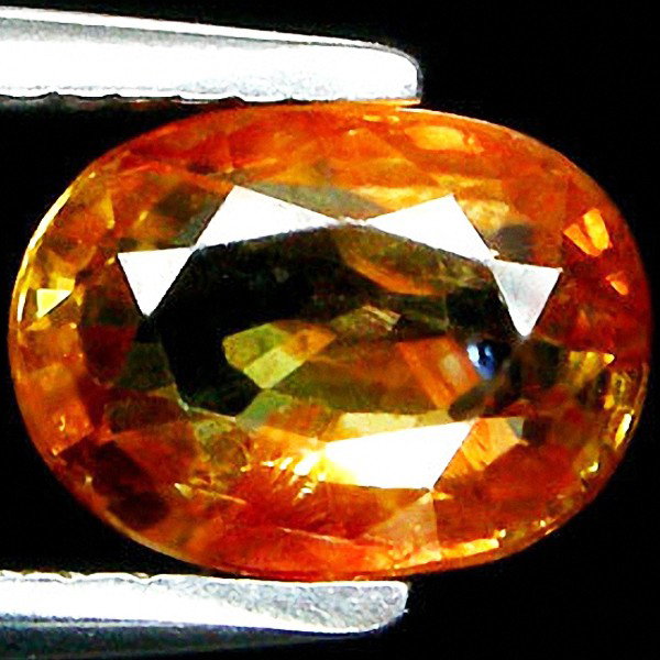 2.42ct Oval Cut Yellow Zircon: Excellent piece; Well cut and colored; with treatment