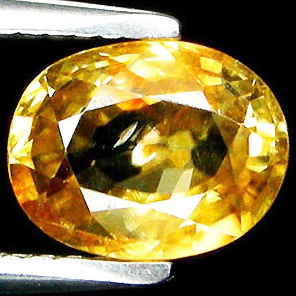 2.24ct Oval Cut Yellow Zircon: Excellent piece; Well cut and colored; with treatment