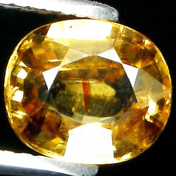 2.64ct Oval Cut Yellow Zircon: Excellent piece; Well cut and colored; with treatment