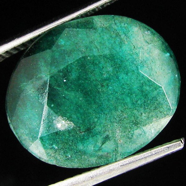 11.71cr Oval Cut Colombian Emerald: Excellent piece; well cut and colored; with treatment