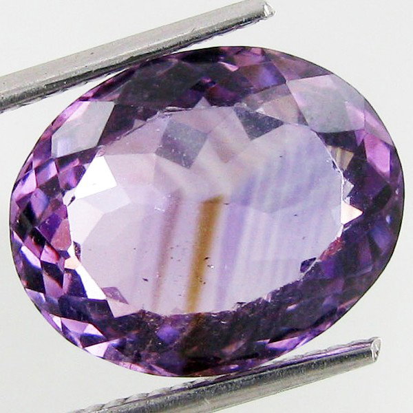 7.04ct Purple Amethyst Oval: Excellent piece; well cut and colored; with treatment