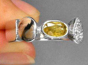 0.82ct Oval Cut Yellow Sapphire White Gold Vermei: excellent well-made ring; gold vermeil