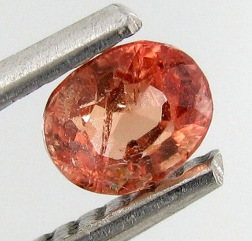 0.42ct Oval Cut Natural Orange Spinel Tanzania: Excellent piece; well cut & colored; with treatment