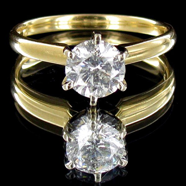 1.06ct White Diamond Appraised $15k: Excellent white colored diamond 14k solitaire cut set in 14k yellow gold; lab quality evaluation grade/color: I-1/F; treatment as noted; Gem Guide wholesale $3180-$5830; full retail appraisal $15175; 