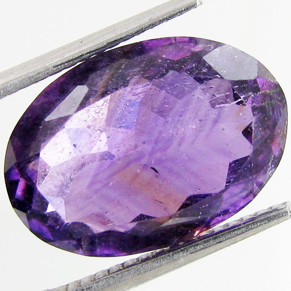 7.25ct Deep Purple Amethyst Oval: Excellent piece; well cut and colored; with treatment