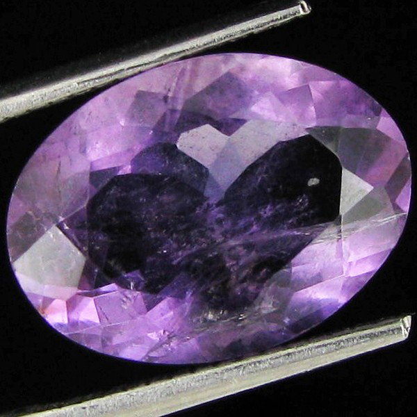 4.68ct Purple Amethyst Oval: Excellent piece; well cut and colored; with treatment