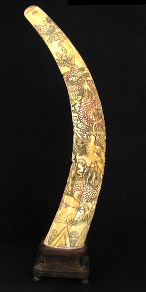 Chinese Handcarved Bone Pheonix Tusk on Base: Excellent handcarved piece; 18"