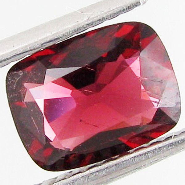 1.46ct Cushion Natural Purplish Red Spinel: Excellent piece; well cut and colored; with treatment