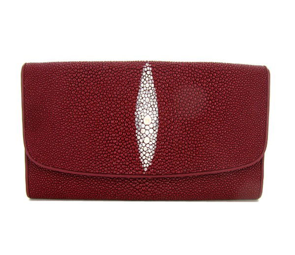 Ladies Stingray Hide Clutch Purse Wallet: Well made; brand new ladies Stingray Hide burgundy clutch purse/wallet. 7.5" x 4" x 1" when folded. Multiple inside sections; one zippered with multiple dividers and a smaller zippered section inside