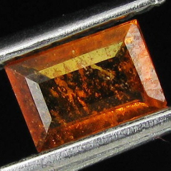 0.35ct Mandarin Fire Orange Clinohumite Emerald ES: Excellent piece; well cut & colored; with treatment