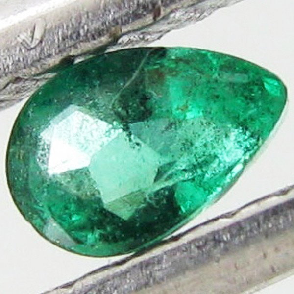 0.1ct Colombian Emerald Pear: Excellent piece; well cut & colored; with treatment