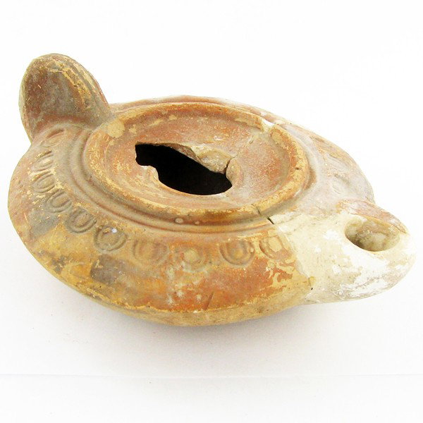 Rare Ancient Roman Oil Lamp 1900 Y/O: Rare intact clay (usually these are broken) oil lamp; excellent earth patina; found intact in Holy Land; 4"; approximately 100 AD