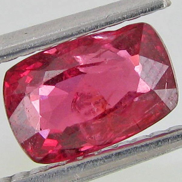 1.28ct Unheated Cushion Top Noble Red Spinel: Excellent specimen; well cut and colored; with customary treatment unless noted otherwise