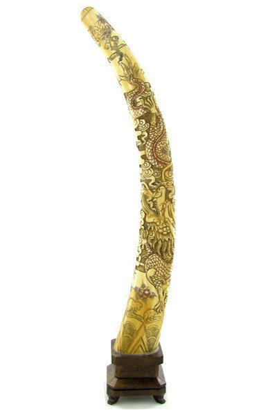 Chinese Handcarved Bone Pheonix Tusk on Base: Excellent handcarved piece; 18"