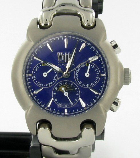 New Wohler Unisex CHRONO Function Watch: Brand New Wohler stylish sport CHRONOGRAPH style watch in excellent new condition with date, 24-hour, weekday and month dials; stainless titanium case and band; box and papers; retail $2295