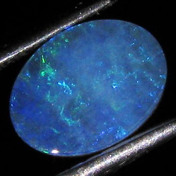 0.89ct Australian Black Opal Doublet Full Fire ES: Rare natural piece full of fire