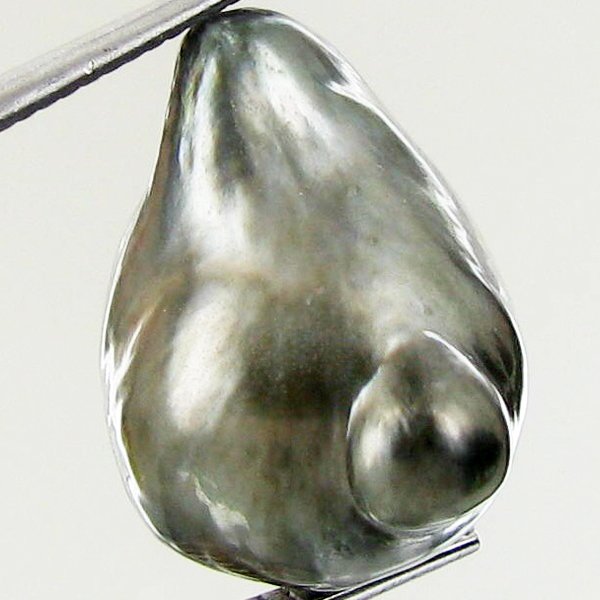 22.69ct Tahitian Baroque Pearl: Baroque shaped; drilled and ready for one-of-a-kind pendant
