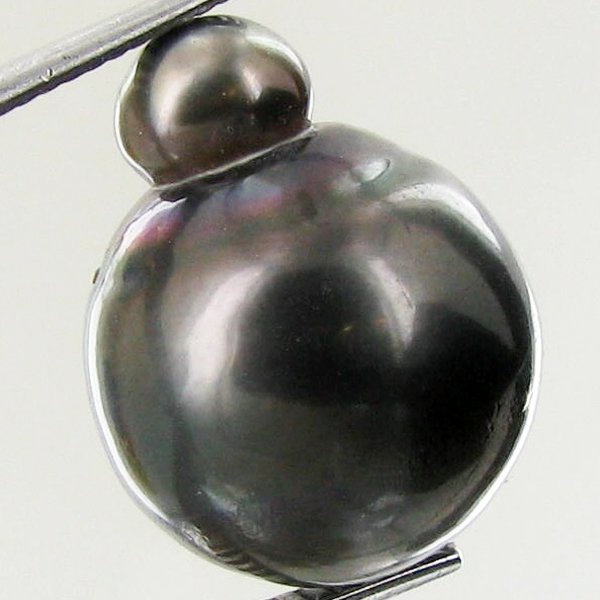 21.81ct Freeform Tahitian Black Pearl: Uniquely shaped; drilled and ready for one-of-a-kind pendant