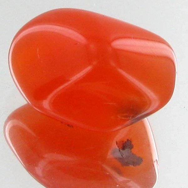 22.85ct Carnelian Freeform Cabochon: Excellent and well colored; with treatment