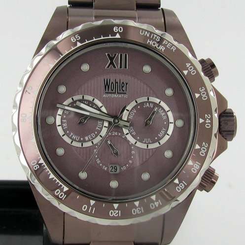 New Wohler Mens CHRONO Function Watch: Brand New Wohler men's stylish sport CHRONOGRAPH style watch in excellent new condition with date, 24-hour, weekday and month dials; stainless bronze IP case and band; box and papers; retail $2295