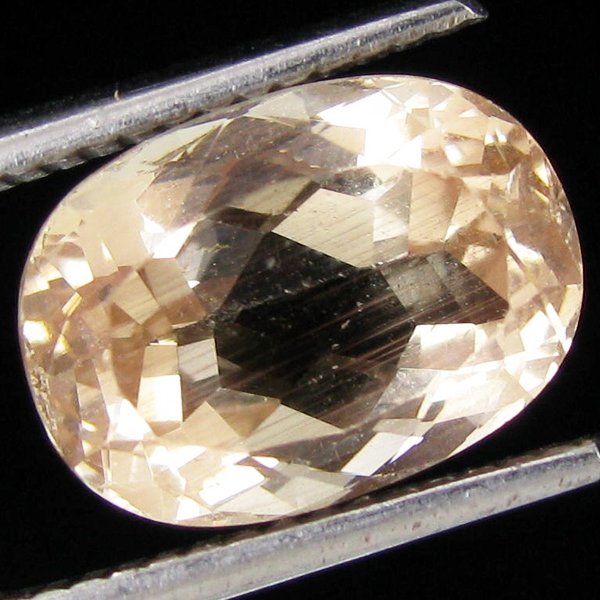 3.85ct Clear Champagne Oregon Sunstone Oval: Excellent hi grade piece; well cut & colored; with treatment