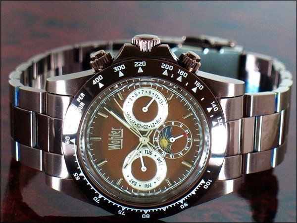 Wohler Mens CHRONO Style Black Stainless Watch: Brand New Wohler men's stylish sport CHRONOGRAPH style shaped watch in excellent new condition with date, month, weekday and seconds dials; stainless black IP case and band; box and papers; 21 JEWELS;