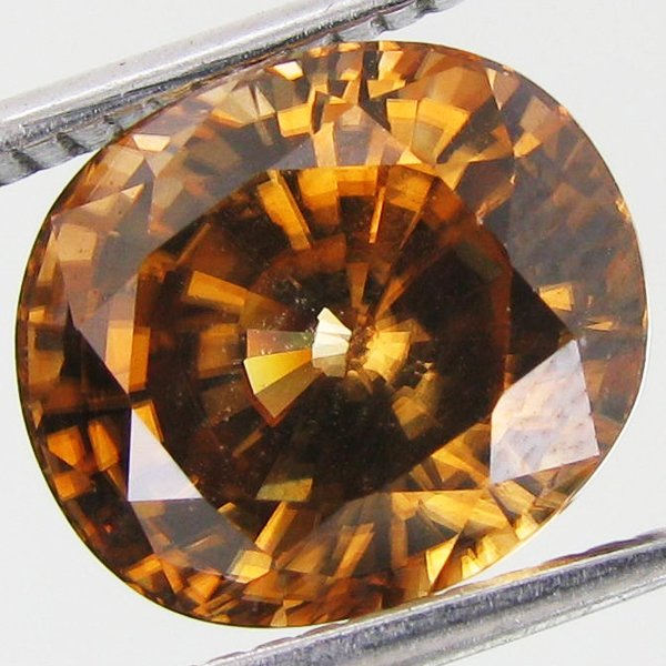 6.65ct Rare Gold Champagne Zircon: Excellent piece; well cut & colored; with treatment